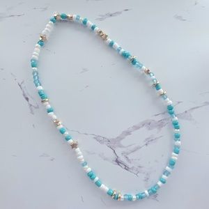 Super cute teal and gold beaded necklace.